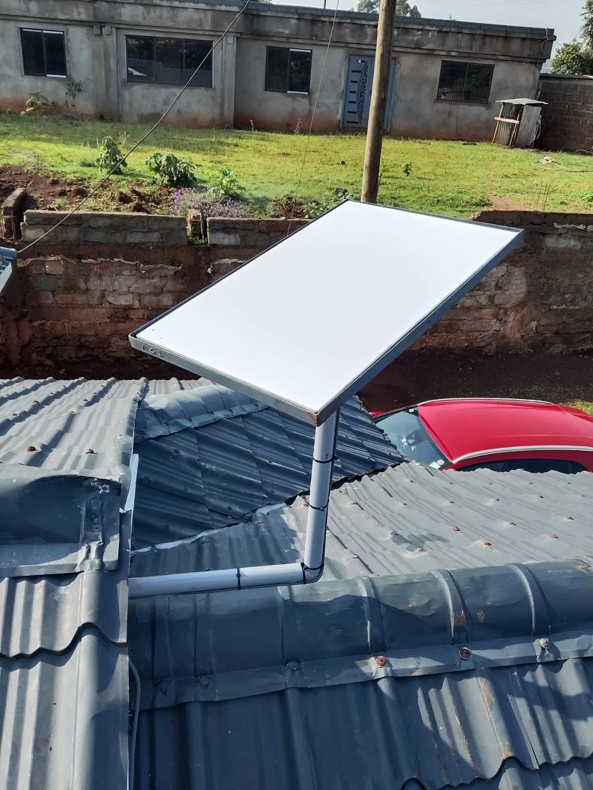 Spacekits Starlink rooftop installation on an iron sheet roof in Kenya, August 2026